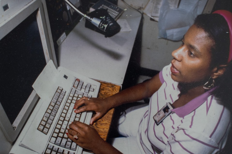 Gladys at work as a NYPD 911 dispatcher said: 'The first caller said, ‘Don’t think I’m crazy but I just saw a plane go into the World Trade Center'