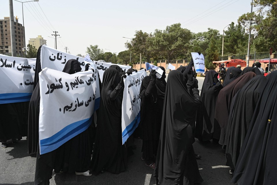 The women stood in rows to march in Kabul