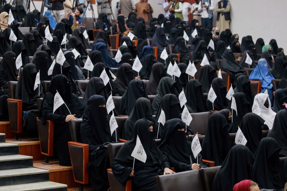 All of the women either wore a blue burka or black niqab in accordance with new rules