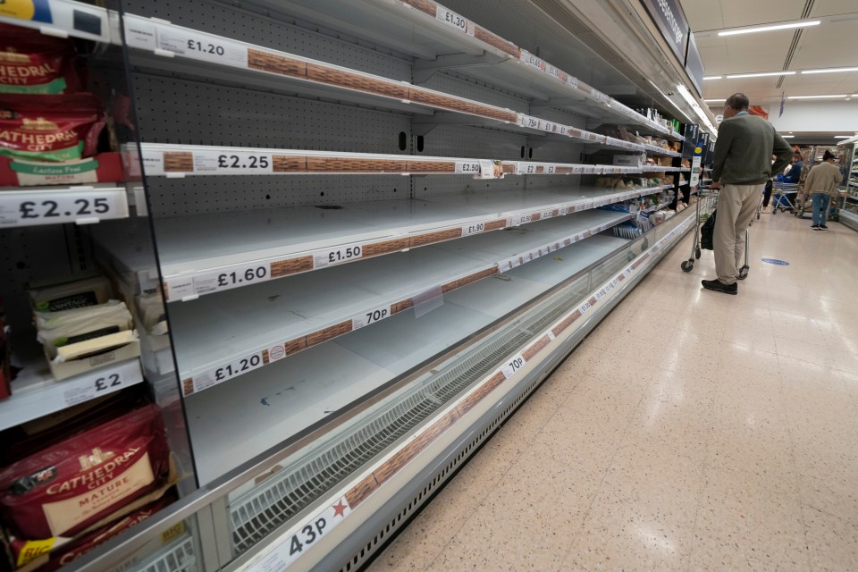 A shopper facing limited supply at a Tesco in Manchester