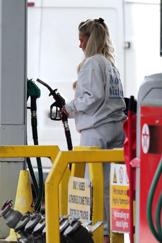 The model and reality star looked stressed as she paid for petrol