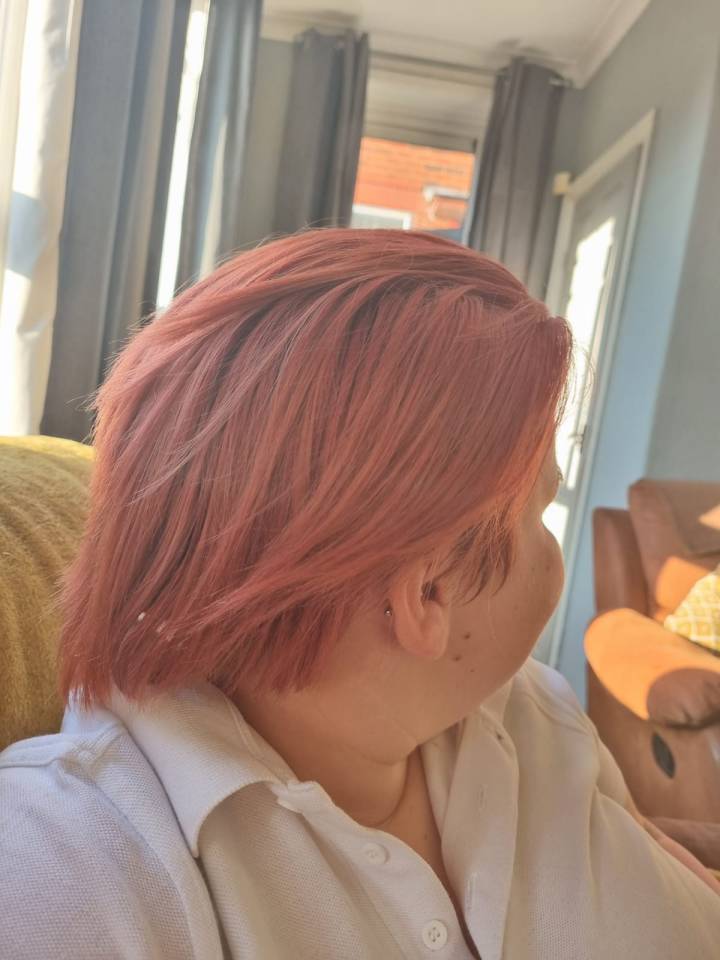 The teen re-dyed the hair to make it more acceptable for school - but teachers still allegedly put her in isolation