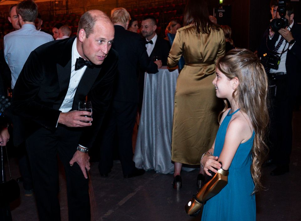 Phoebe Sinclair, 9, meeting the Prince as he mingled at the event