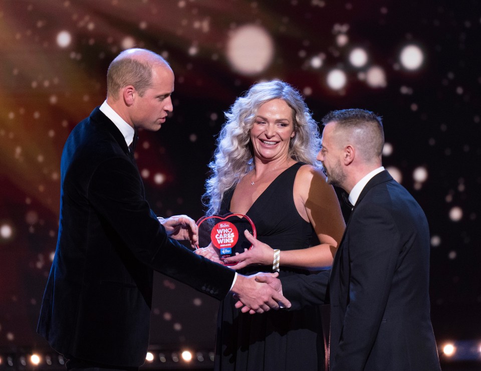 Prince William handing the award to the deserving winners of the 999 Hero category