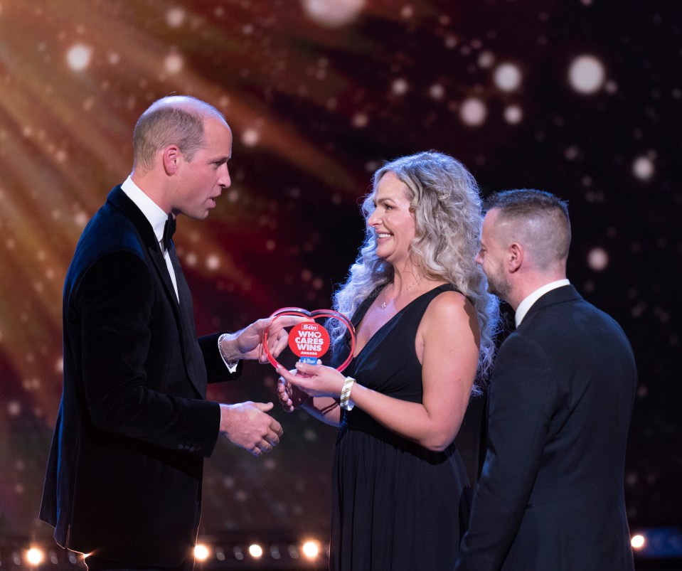 Prince William presents the ‘999 Hero’ gong to paramedics Deena Evans and Mick Hipgrave at The Sun’s Who Cares Wins awards