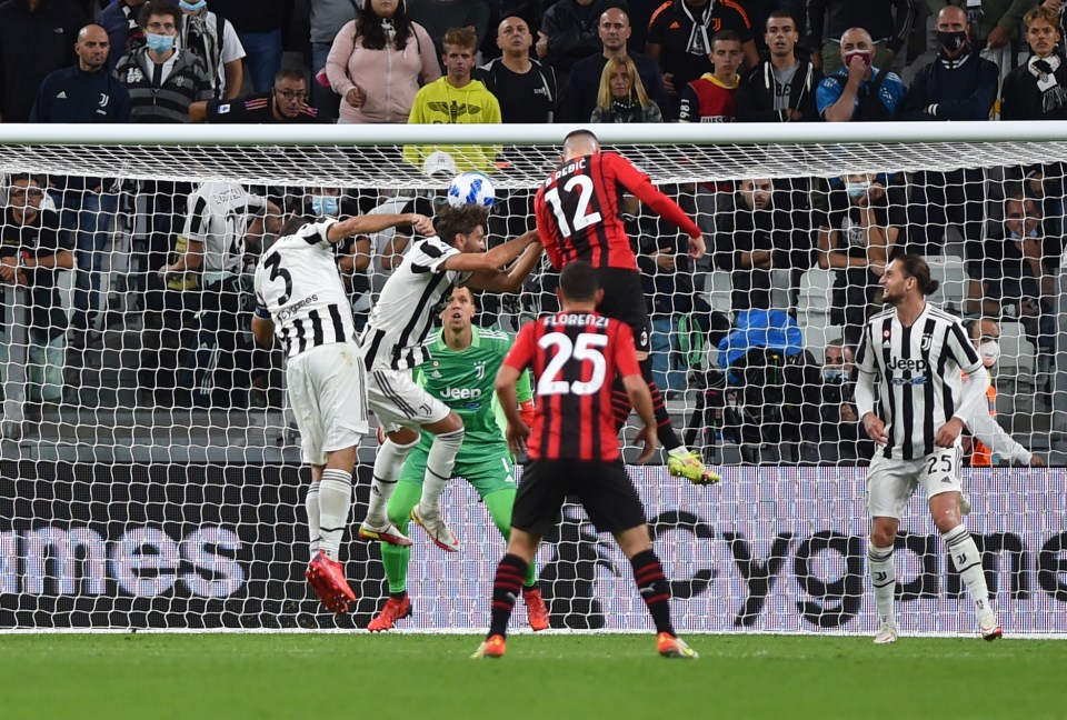 Ante Rebic rose highest to nod home the equaliser as AC Milan drew with Juventus