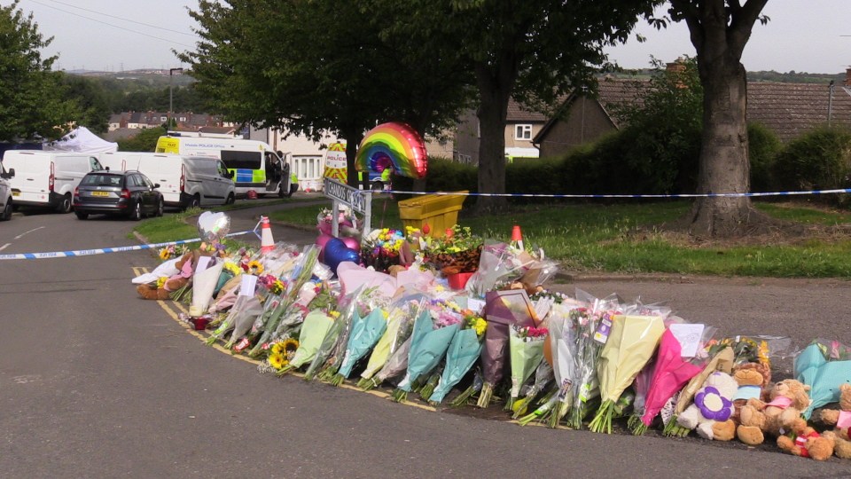 A sea of floral tributes grew near to the scene in Chandos Crescent, Killamarsh, near Sheffield