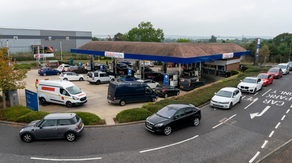 Drivers queueing to get fuel at Tesco petrol garage in Basildon, Essex