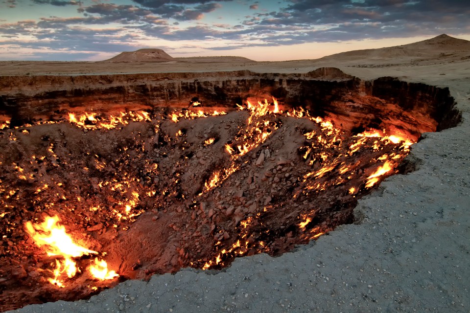 The Darvaza gas crater is a fiery pit kept ablaze by a supply of natural gas