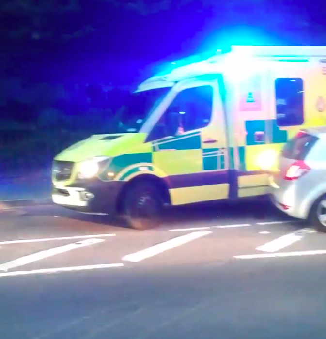 The ambulance hit a car as it tried to get through the queue