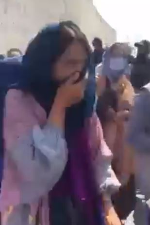 Video shows women coughing and spluttering at the Taliban forces move in