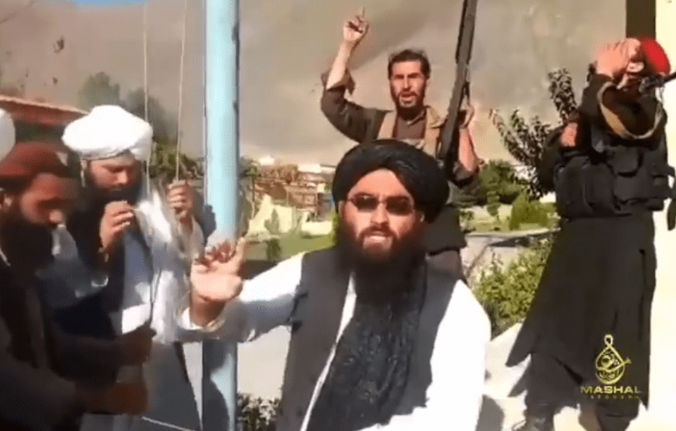 Taliban fighters celebrate as they declared a 'crushing' victory in Panjshir