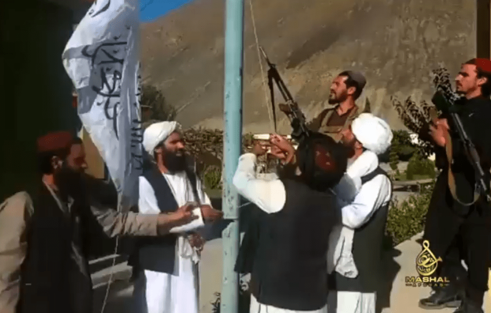 Taliban fighters raised their flag in the Panjshir Valley