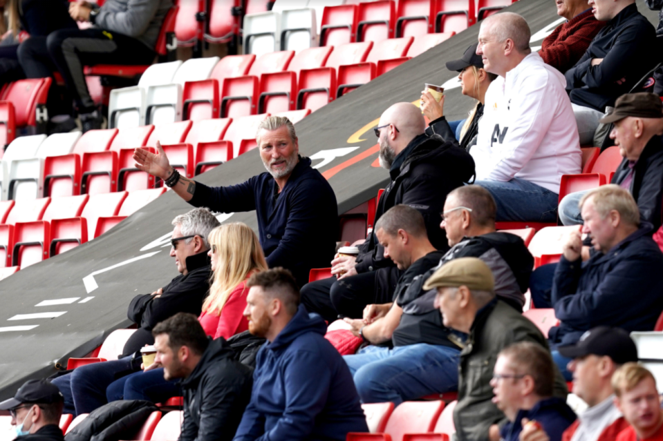 Robbie Savage was an animated spectator as son Charlie and Co faced the Spanish side