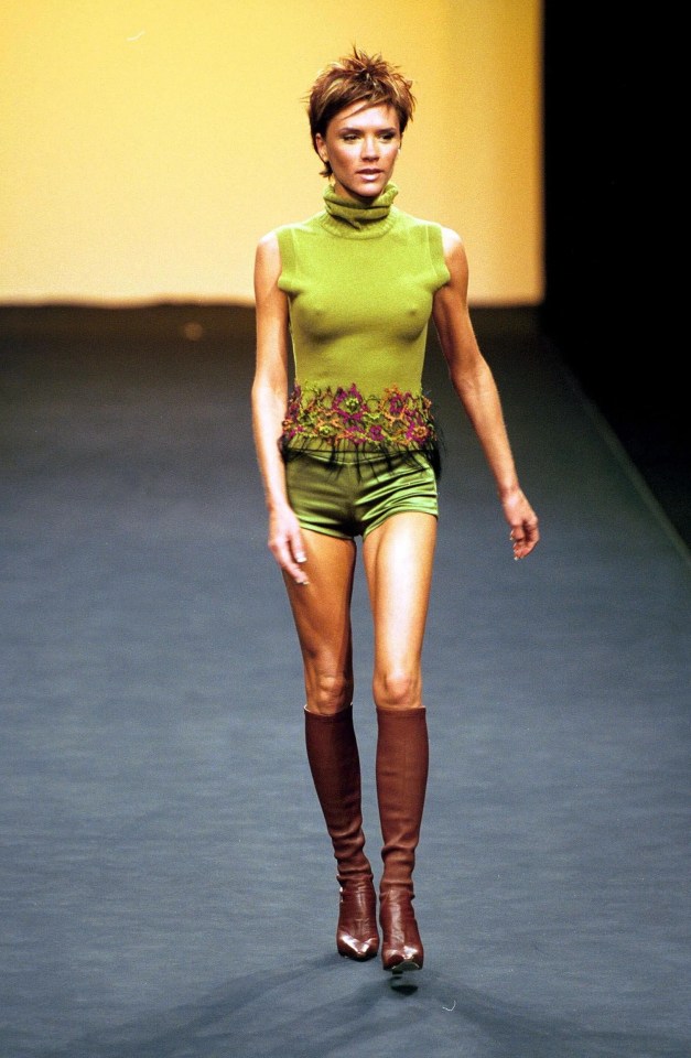 Posh strutting her stuff in green as she modelled in 2000