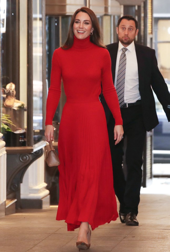 Smiling Kate arrived in a red ensemble