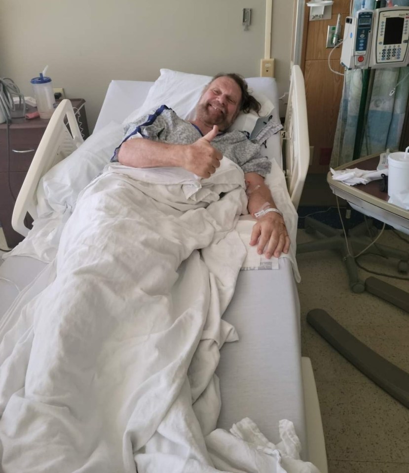 Hacksaw Jim Duggan gives the thumbs up from his hospital bed