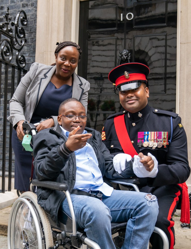 Calvin with mum Maureen, who asked the Chancellor in her letter to give disabled children and carers their funding back