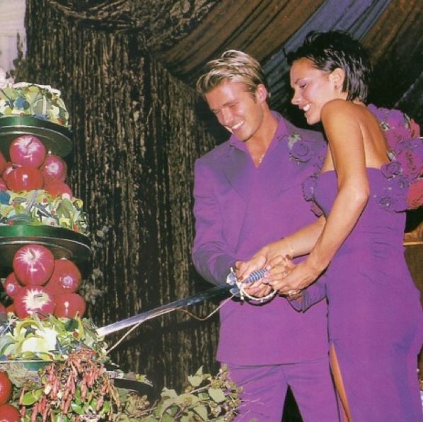 The couple wore matching purple outfits on their wedding day