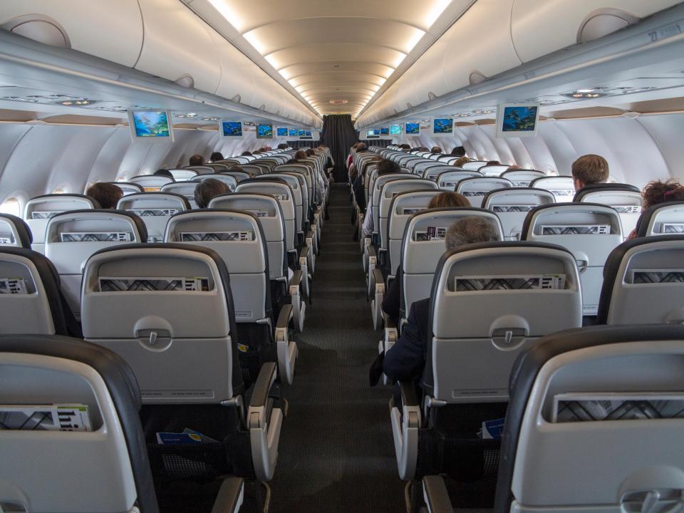 Book the aisle and the window seat - as passengers are unlikely to choose the middle one