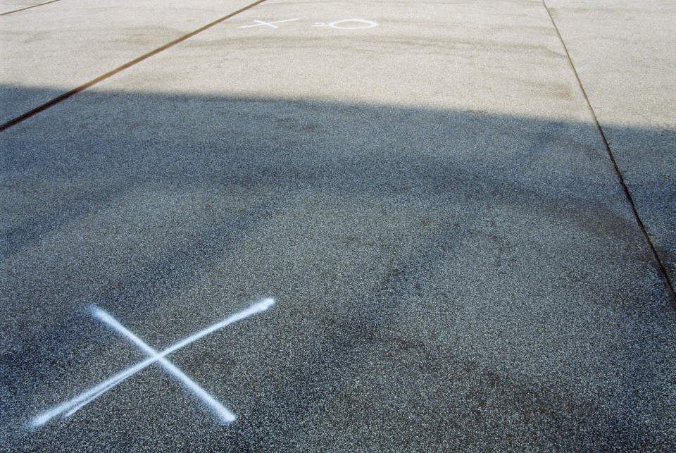 Chalk markings on the pavement or wall outside a house is a method of picking out a potential victim