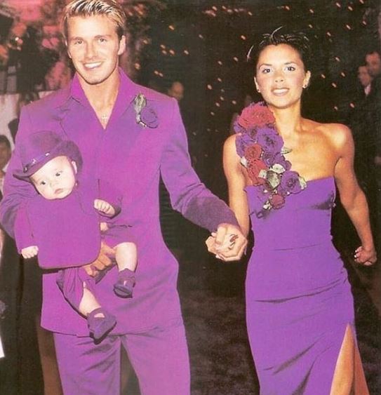 Bright idea, the pair matching in purple on their wedding day