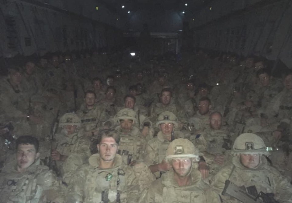 Brit troops pictured on flight home from Kabul as airlifts stopped