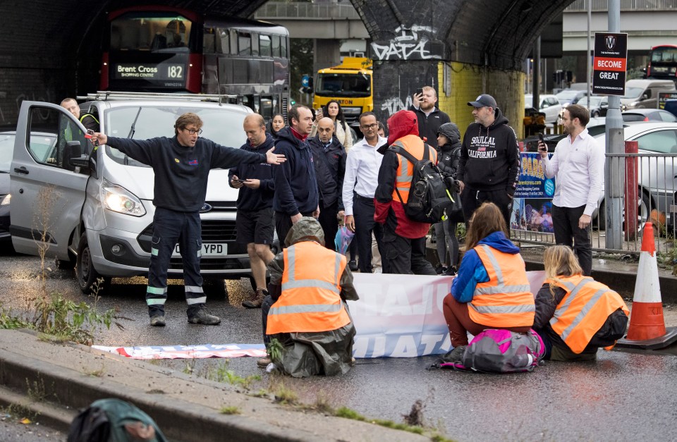 Angry motorists clash with protesters on the M`1