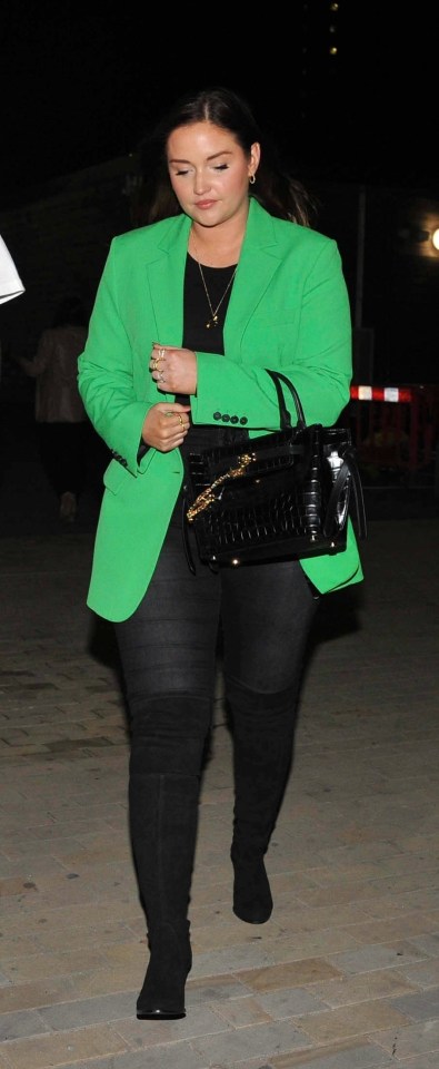 Former EastEnders actress Jaqueline wore an on-trend green blazer paired with jeans and heels