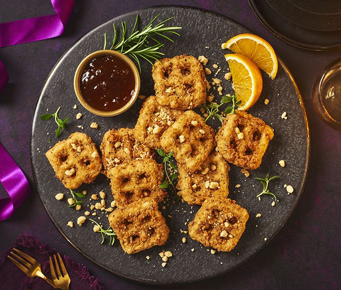 The chicken waffles come with a spiced-maple sauce