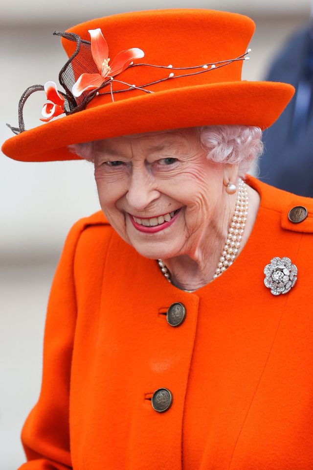 Her Majesty grinned alongside her youngest son