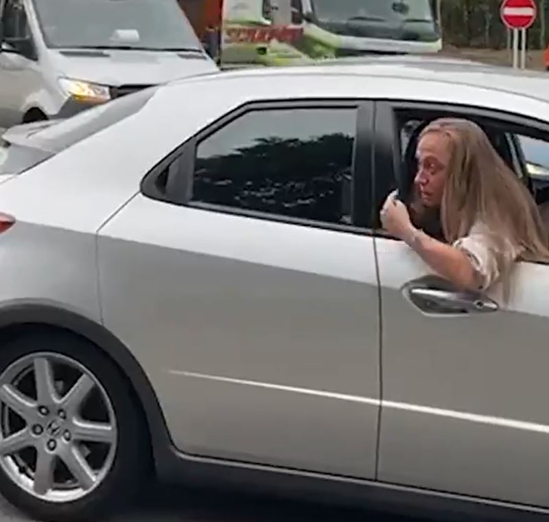 One mum took aim at the banner-clutching demonstrators for making her daughter late to school