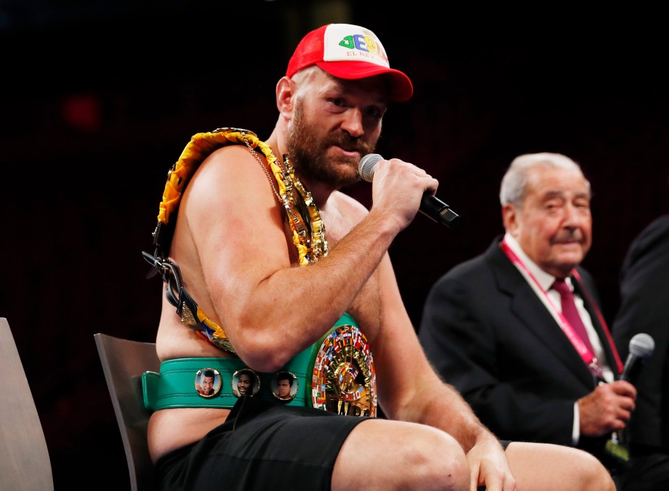 Tyson Fury next to promoter Bob Arum