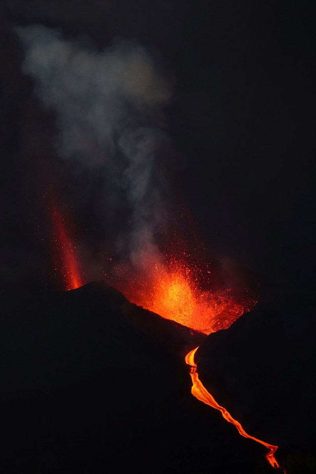 The Cumbre Vieja volcano spews lava and smoke as it continues to erupt