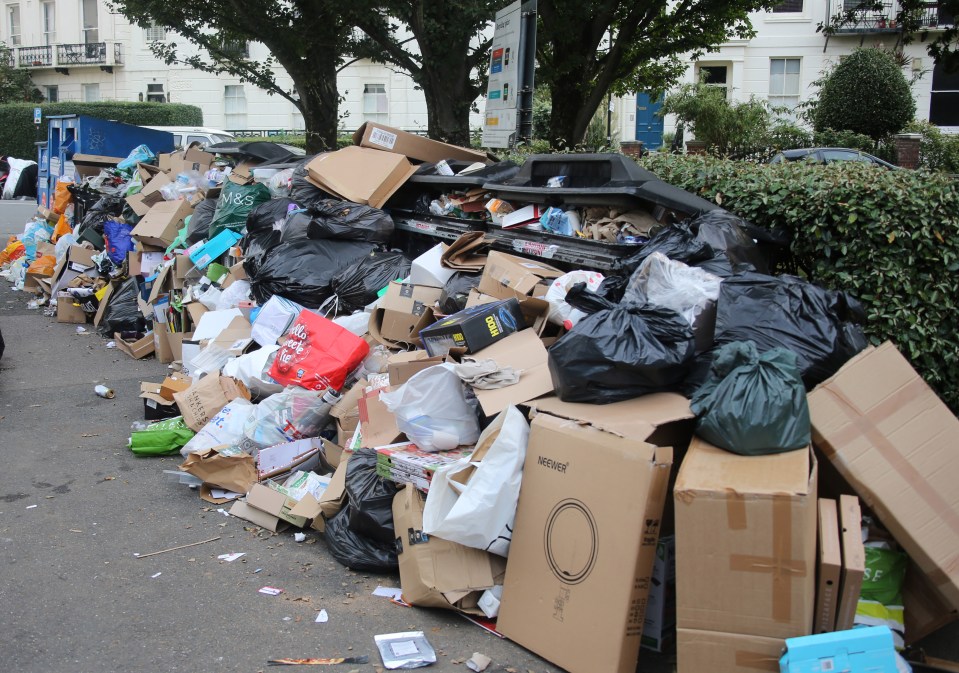 Huge piles of rubbish are building up in the streets - and the strike could continue until mid-November