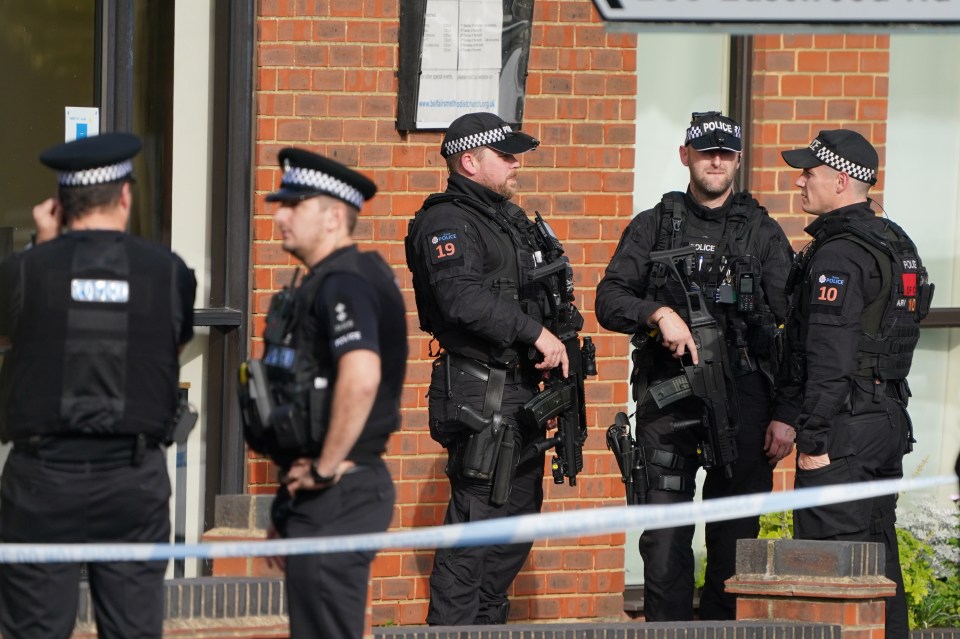 Armed police at the scene of the brutal attack that has seen one man arrested