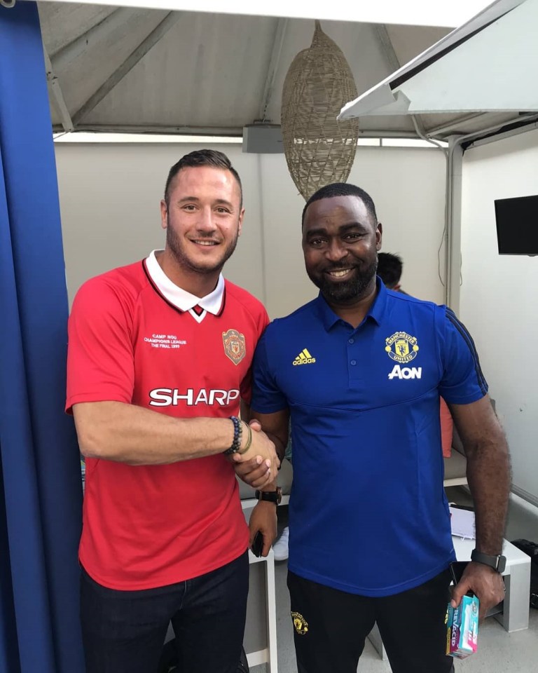 Mountain, seen here with Andy Cole, remains football mad