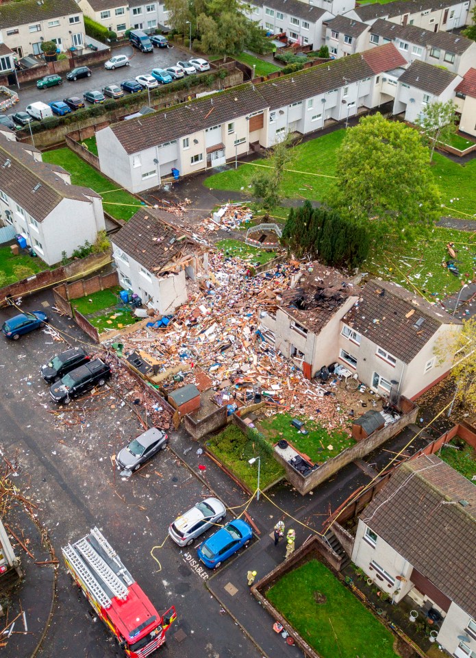 Bricks, wood, glass and personal belongings were blasted across the street