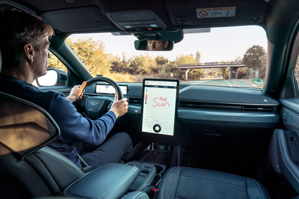 The interior is on-point: Big upright screen like a Tesla, except this car is better