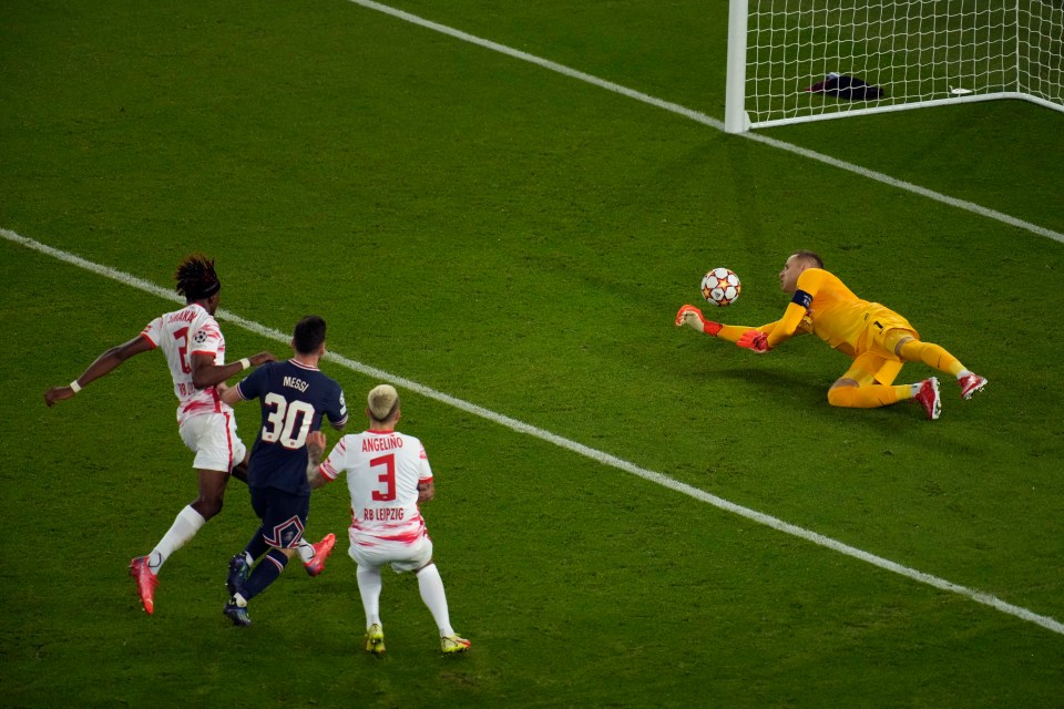 Lionel Messi slips home his first goal to make it 2-2 before hitting PSG's winner