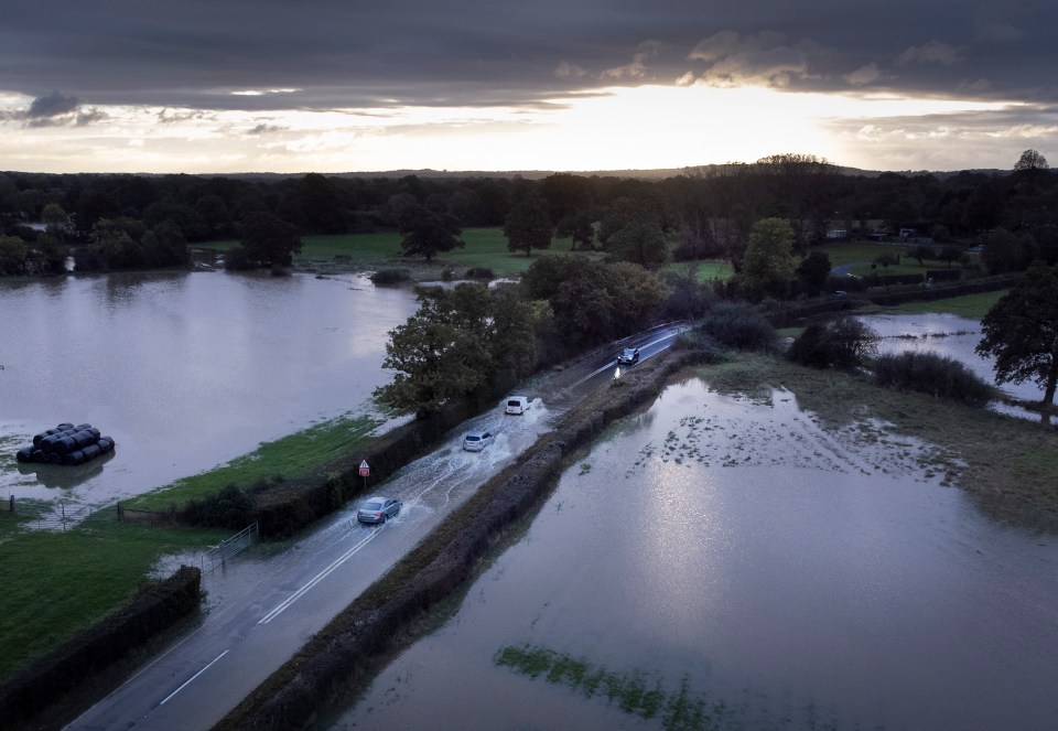 Rainwater flooded fields in Lingfield, Surrey, last night