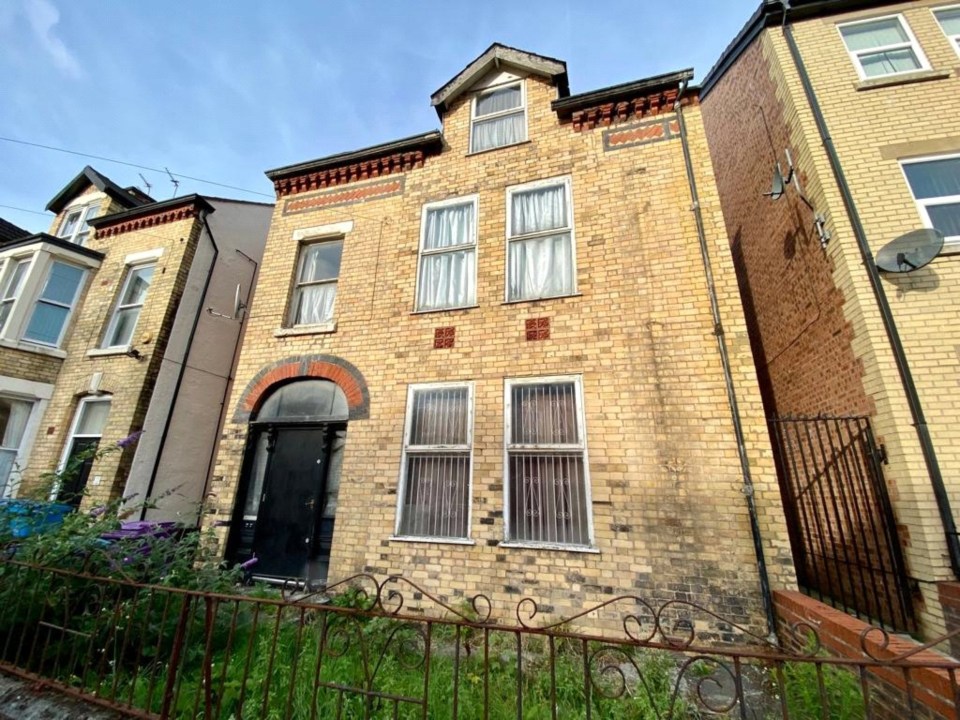 The three-storey home in Liverpool is on sale for £125,000