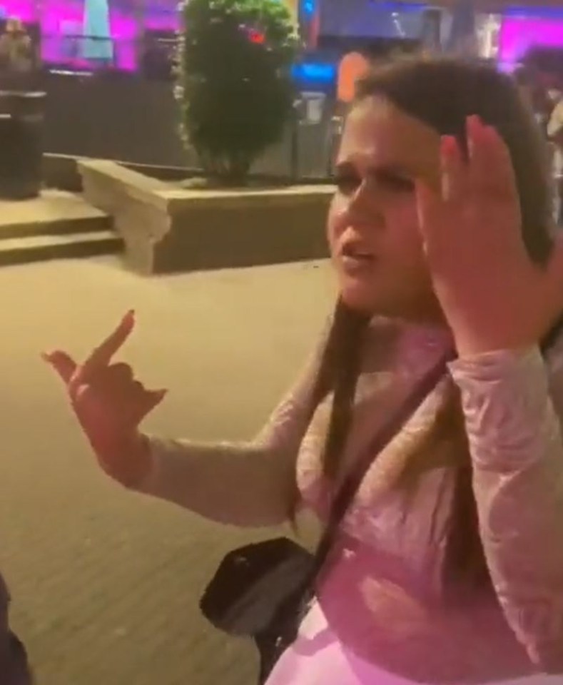 The woman is filmed complaining she has been booted out of the venue