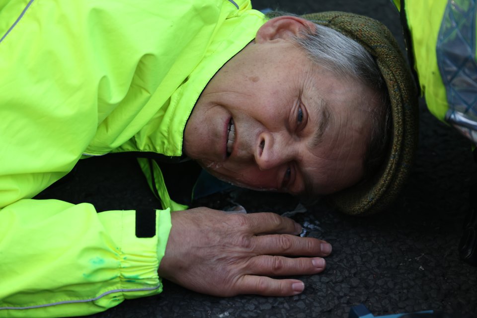 One protester glued his face to the floor