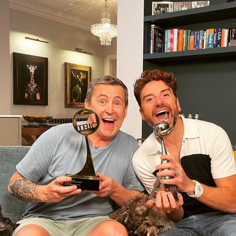 The couple posing in their home with Gogglebox’s Tric and National Television awards last year