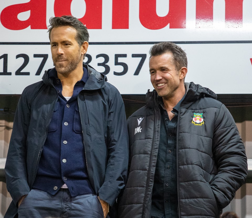 Ryan Reynolds (left) and Rob McElhenney watch Wrexham in action for the first time