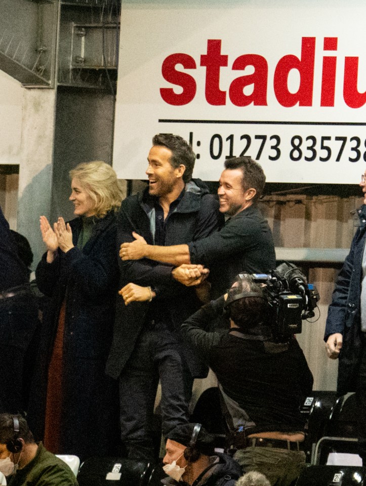 Reynolds and McElhenney embrace after witnessing their first Wrexham goals live