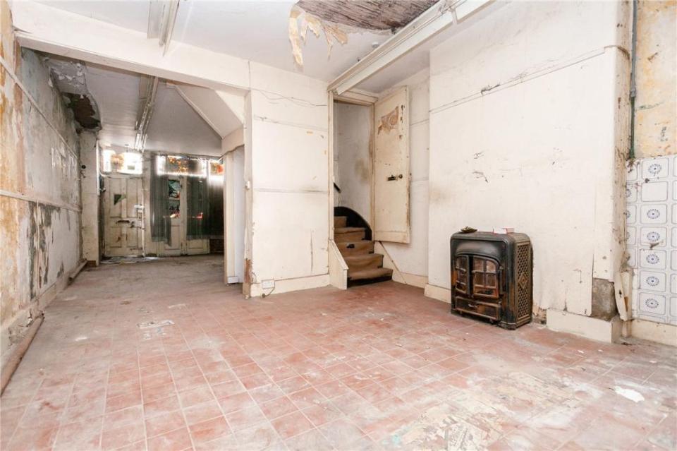 The property is in a state of complete disrepair inside and will need a complete overhaul