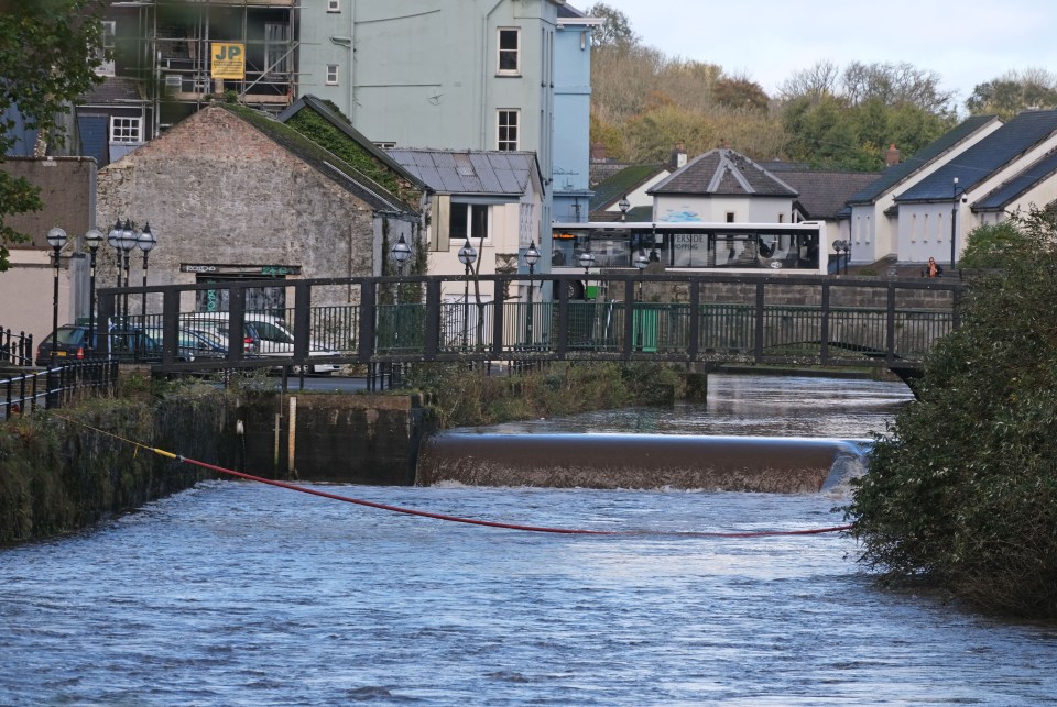 A sudden storm had turned the river into a torrent