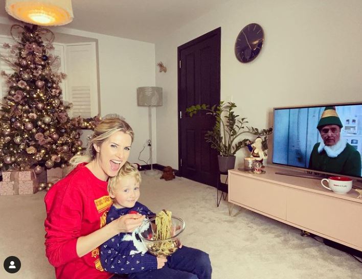 Sarah's family room features a pink TV stand